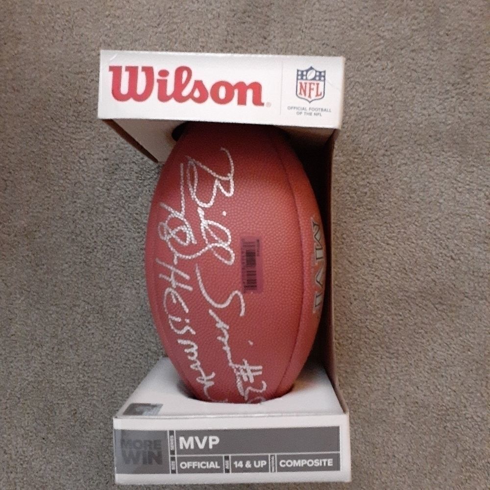 Billy Sims autographed brand new Wilson football.